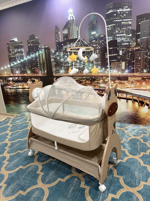 Электронная люлька-баунсер