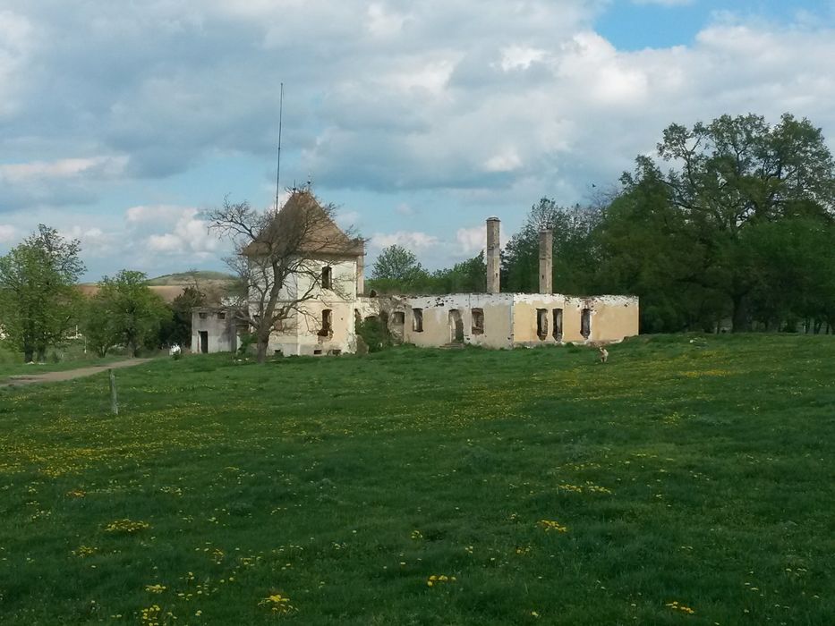 Vand sau schimb teren intravilan6,5ha si constr. la 40 km de Cluj