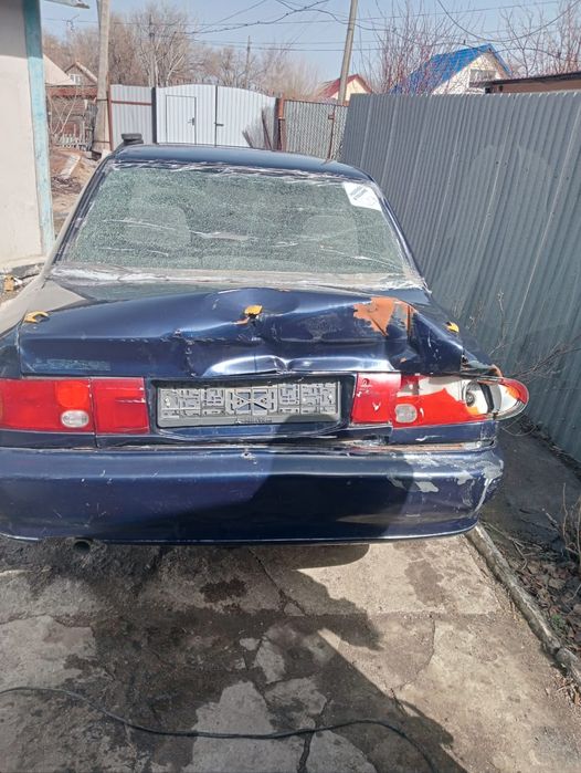 Митсубиси Лансер.