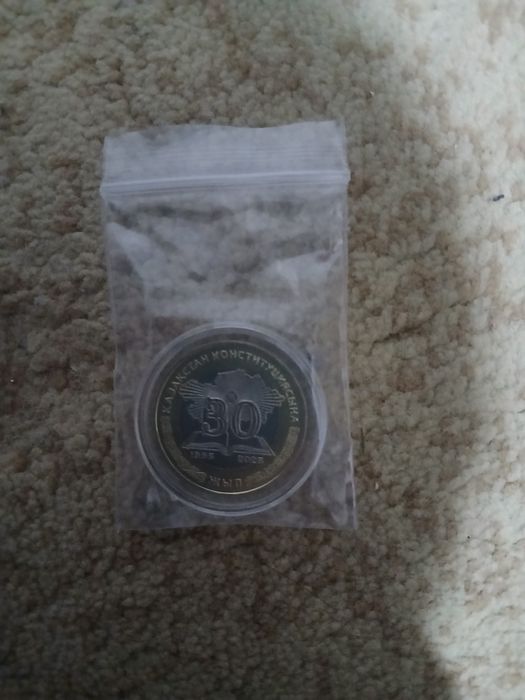 Продам монетка 100 тг 30 лет