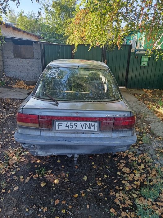 Продам Mitsubishi Lancer 1991год