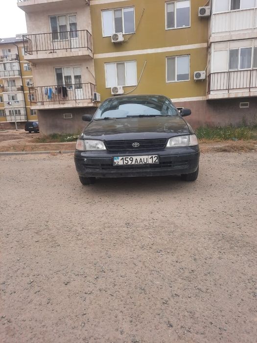 Тойота карина е 1.6