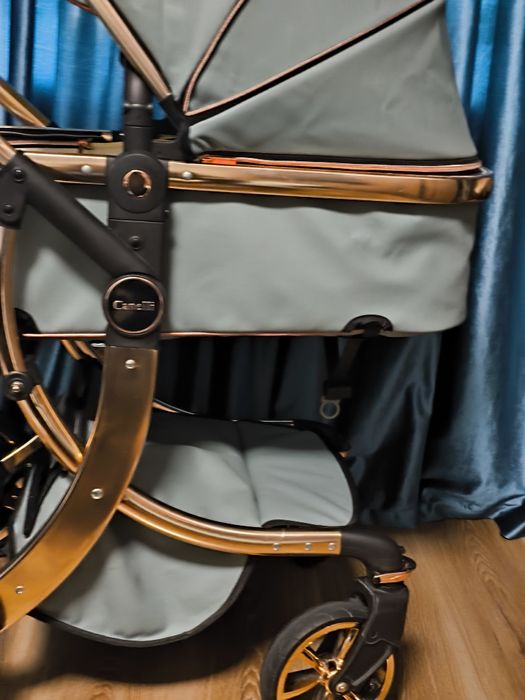 Детская коляска из кож.заменителя