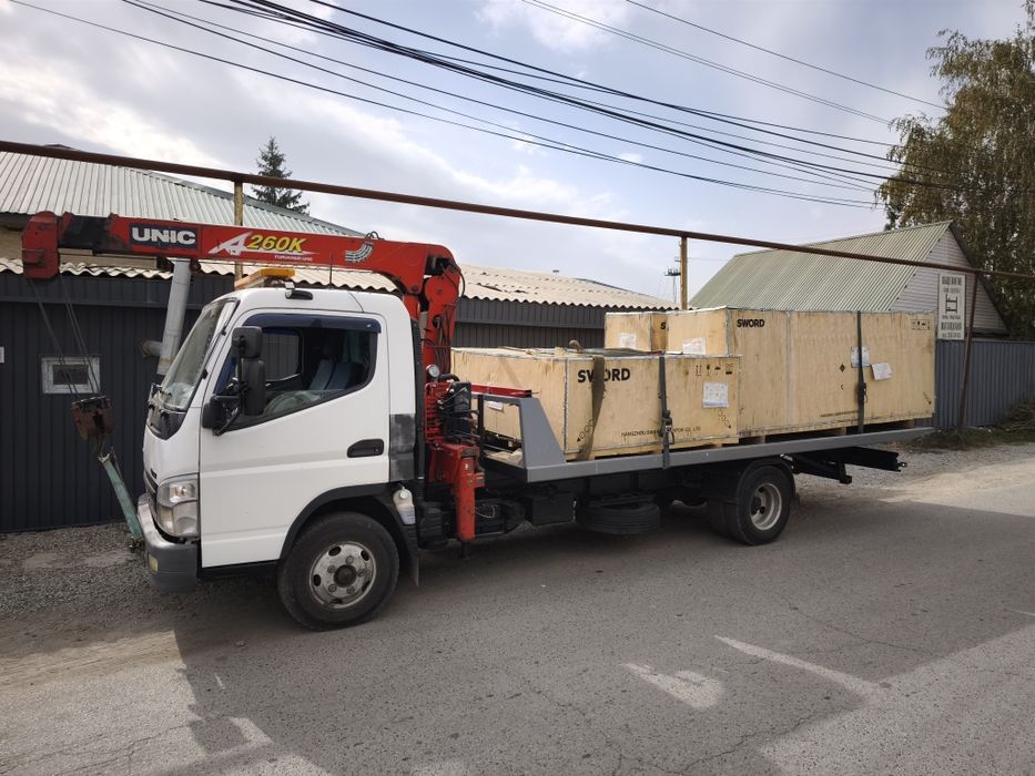 Грузовой эвакуатор манипулятор