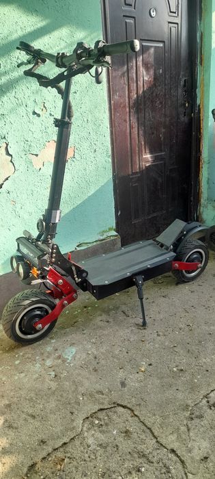 Trotinetă Electrică Dual Moto Halo Kinght  T 108 5600W 60 V 38 Ah Viteză 85 km Autonomie 80
