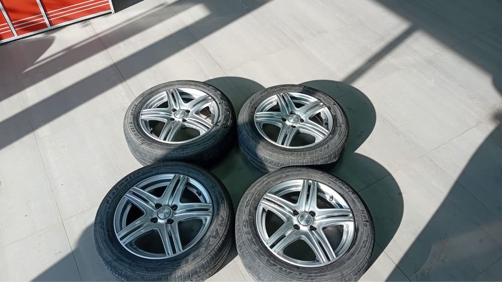 Диски с резиной.