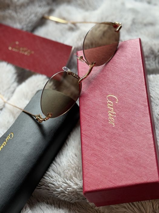 Ochelari de soare Cartier – model rotund fără ramă, auriu, unisex