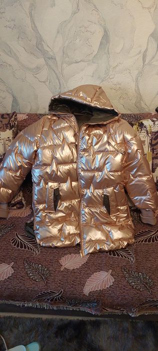 Продам новый пуховик