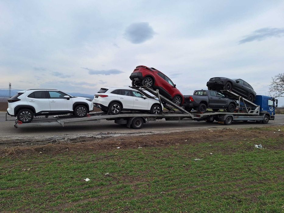 Transportor auto Mercedes Atego cu structura transport auto