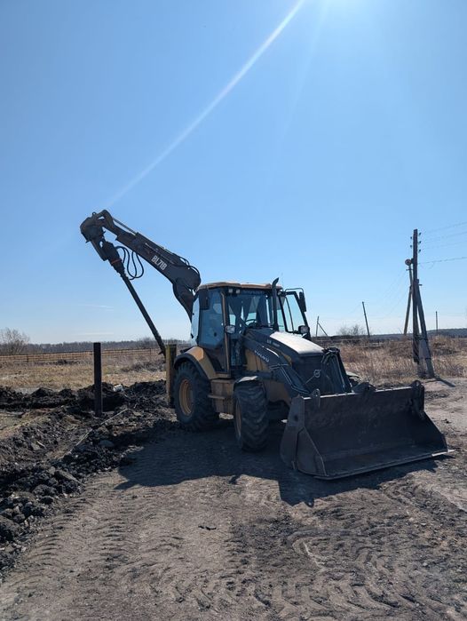 Услуги экскаватора -погрузчика (гидробур)