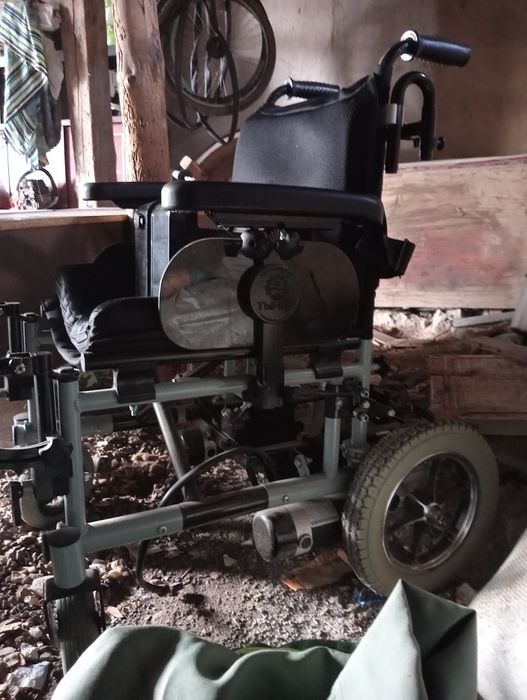 Электронная инвалидная коляска