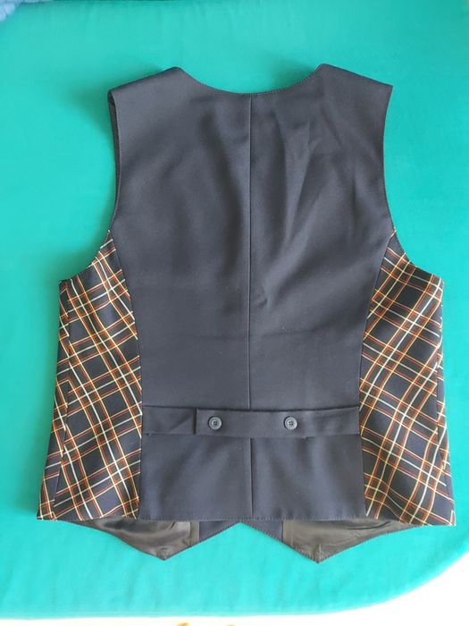 Школьная жилетка