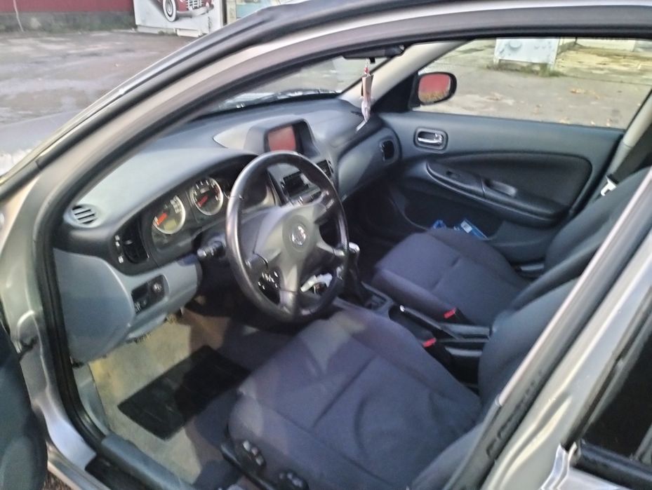 Vând Nissan almera 2006 decembrie,1,5 benzina