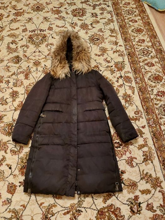 Продам женский пуховик