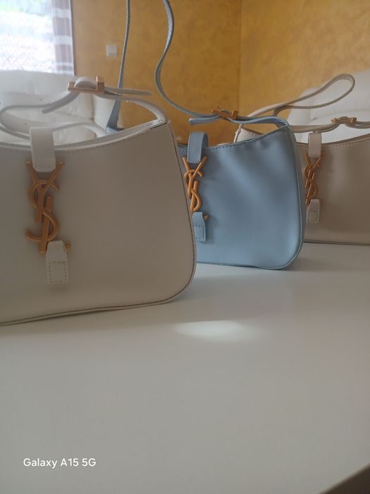 Елегантна дамска чанта кожена с цип.