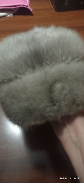 Продаю  женскую мутоновую шубу