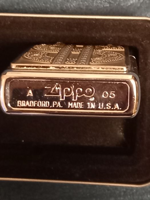 Kолекционерско ZIPPO "Dollar Sign" с камини  (Ян.   2005)  - Made  USA