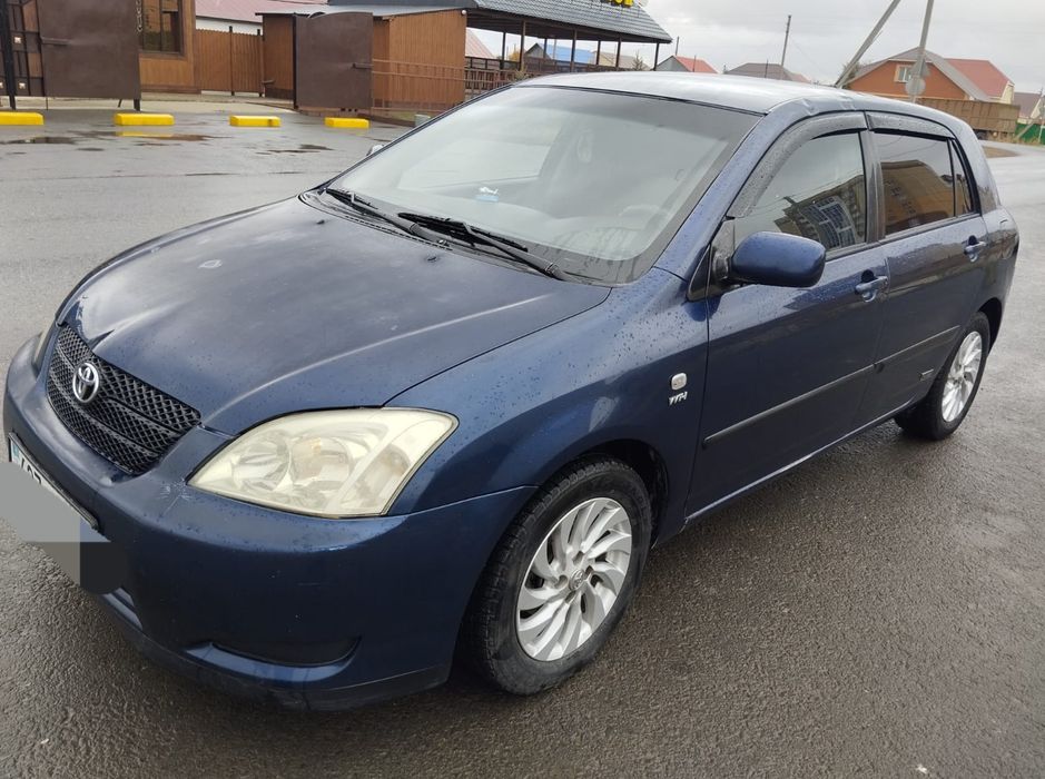 Тойота  Королла  Е120