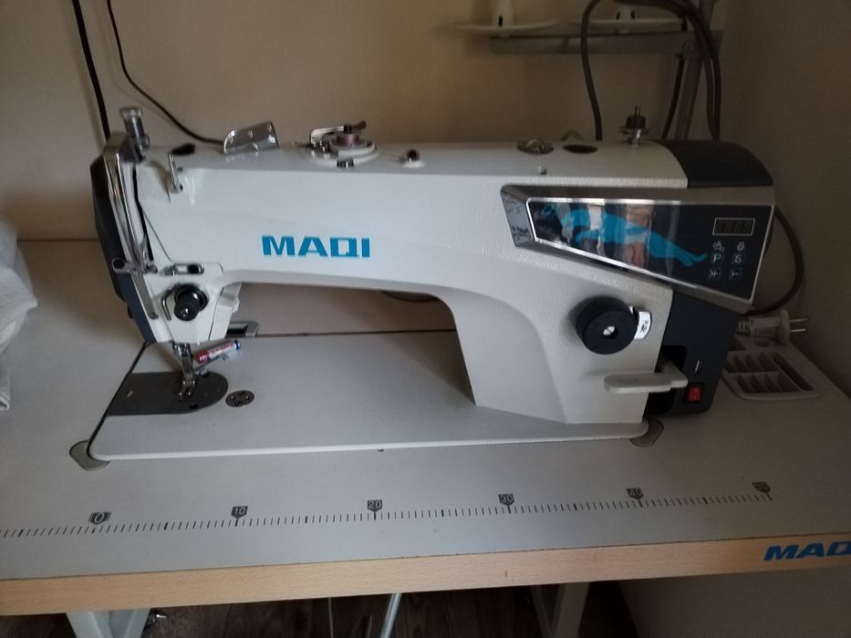 tikyv mashinasi MAQI bir chok yangidek  holatda