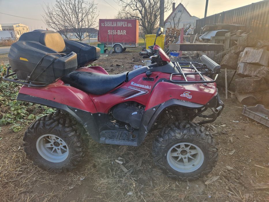 Vând sau schimb ATV Kawasaki