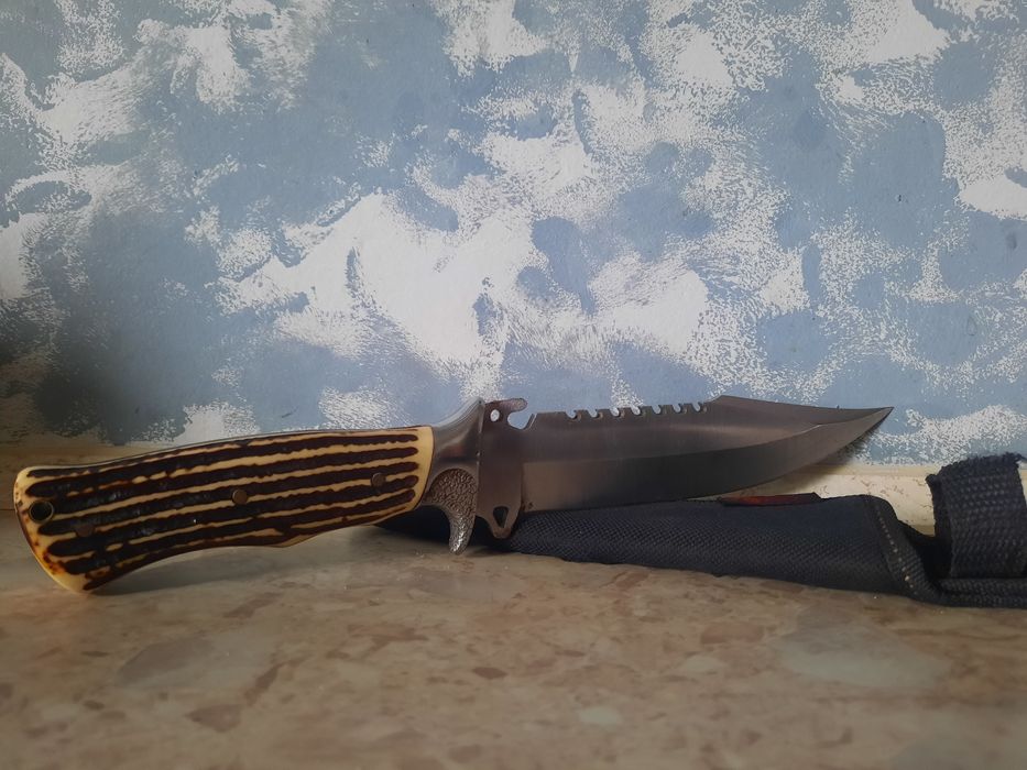 Cutit vanatoare, Depox, lama otel zimtata, 30 cm, teaca inclusa

Estim