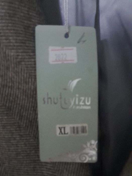 Продам новое пальто