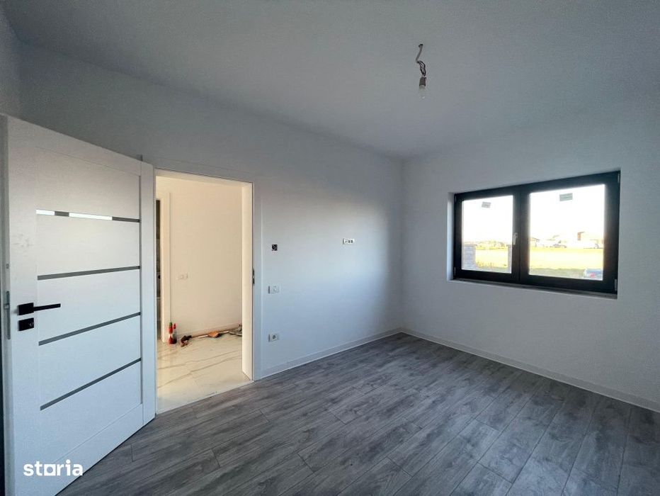 Duplex despartit prin camera tehnica  finisaje premium Mosnita