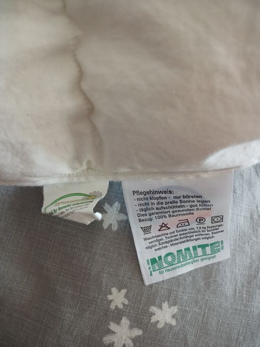 Pilotă din pene și puf pentru iarnă