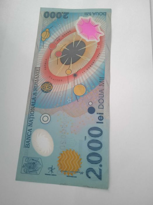 Bancnota de colecție, cu eclipsa, de 2000 lei, din 1999