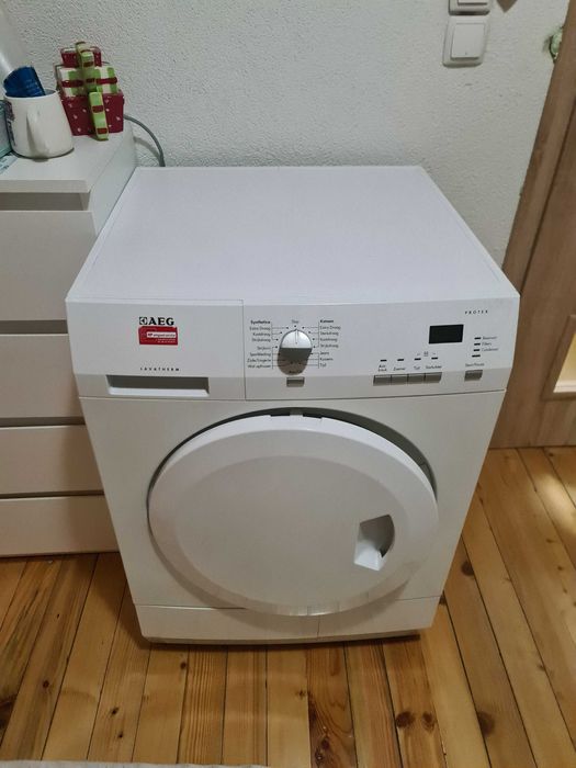 Икономична сушилня AEG (Термопомпа) – Дрехите излизат като изгладени!