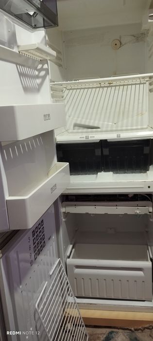 Холодильник стинул