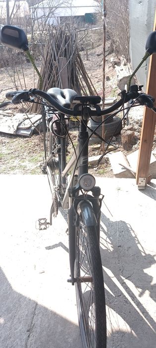 Bicicleta electrica asistata cu 9 viteze electric și 21 mecanice