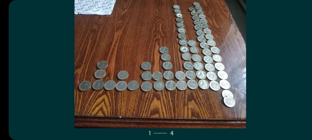 Нумизмат монеты 100 тенге