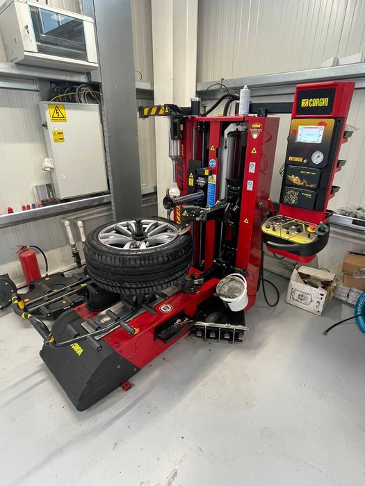 Mechanic at work with machine on elevator