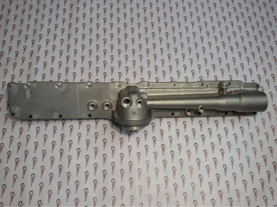 Теплообменник Головка фильтра Cummins Buhler