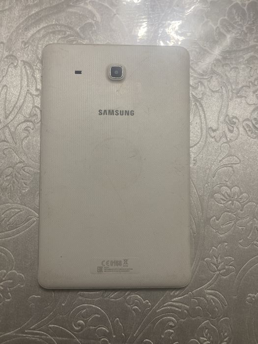 Samsung планшет.