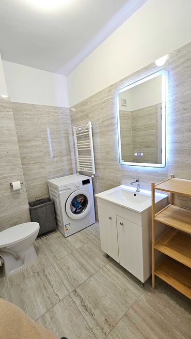 Apartment 2 camere de inchiriat! 10 min metrou. Parcare acoperita. 71mp. 2 balcoane. Bloc nou. Etaj 1