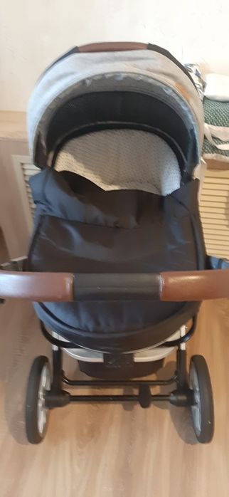 Продам коляску и стульчик