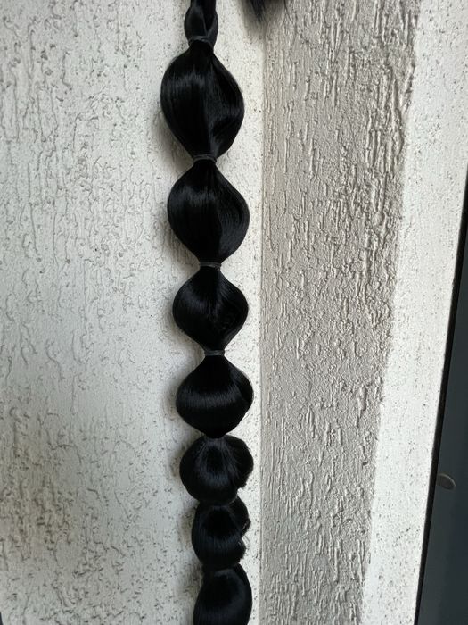 Coada de par lunga  bruneta eleganta