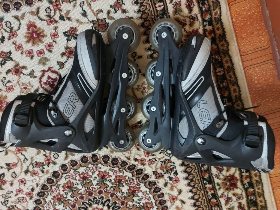 Роликовые коньки