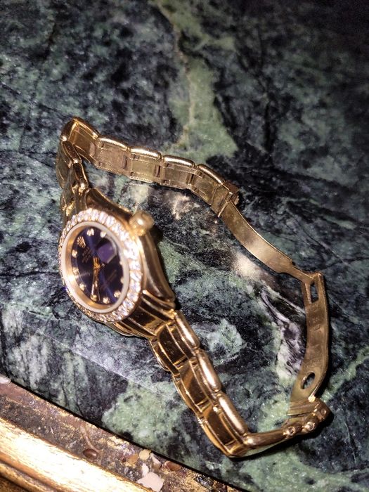 Rolex date just,damă ,31 mm aur 18 kt.