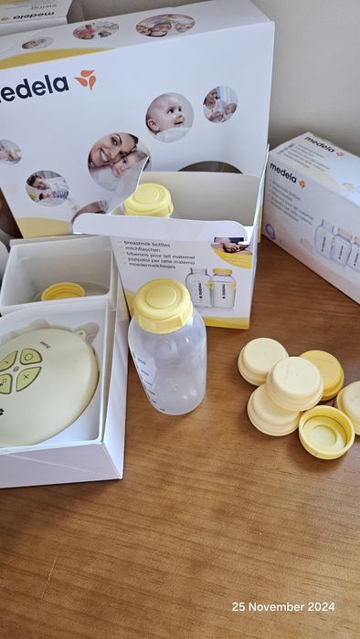 Pompă electrică Medela + biberoane