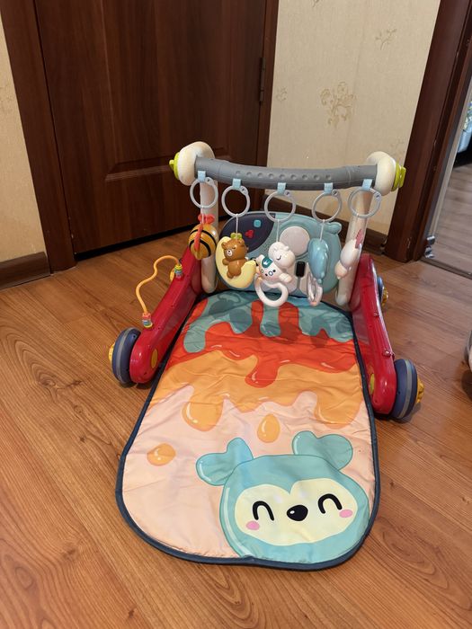 Музыкальный коврик и толокар