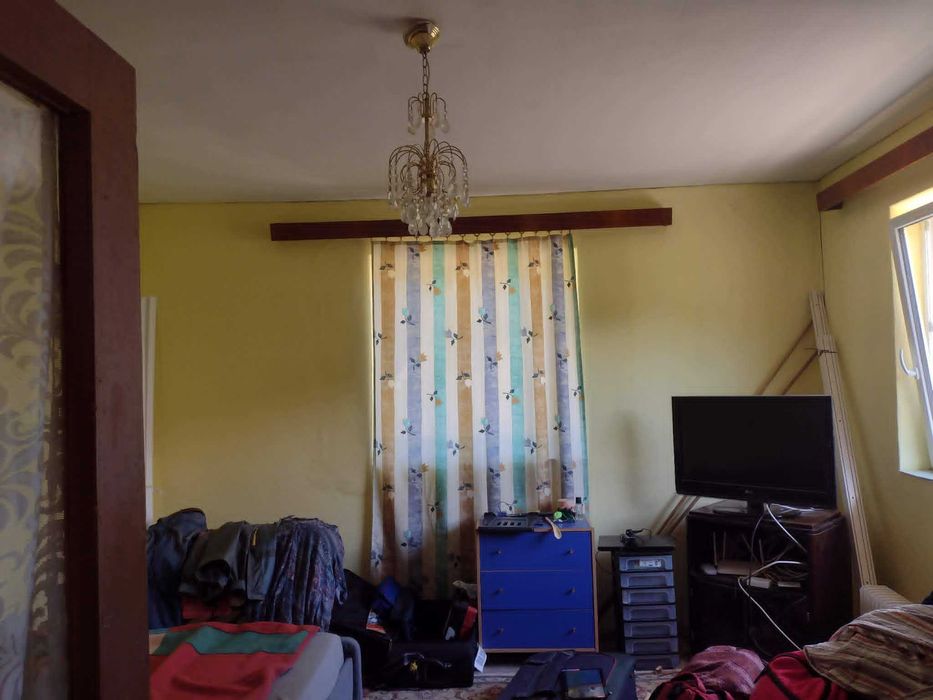Casa de vanzare impreuna cu 2 terenuri intravilan , formand un tot unitar