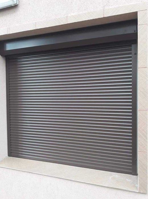 RULOURI Aluminiu si Usi de garaj rezidentiale SECTIONALE