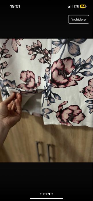 Fusta dama, in stare buna, cu flori, a fost modificata