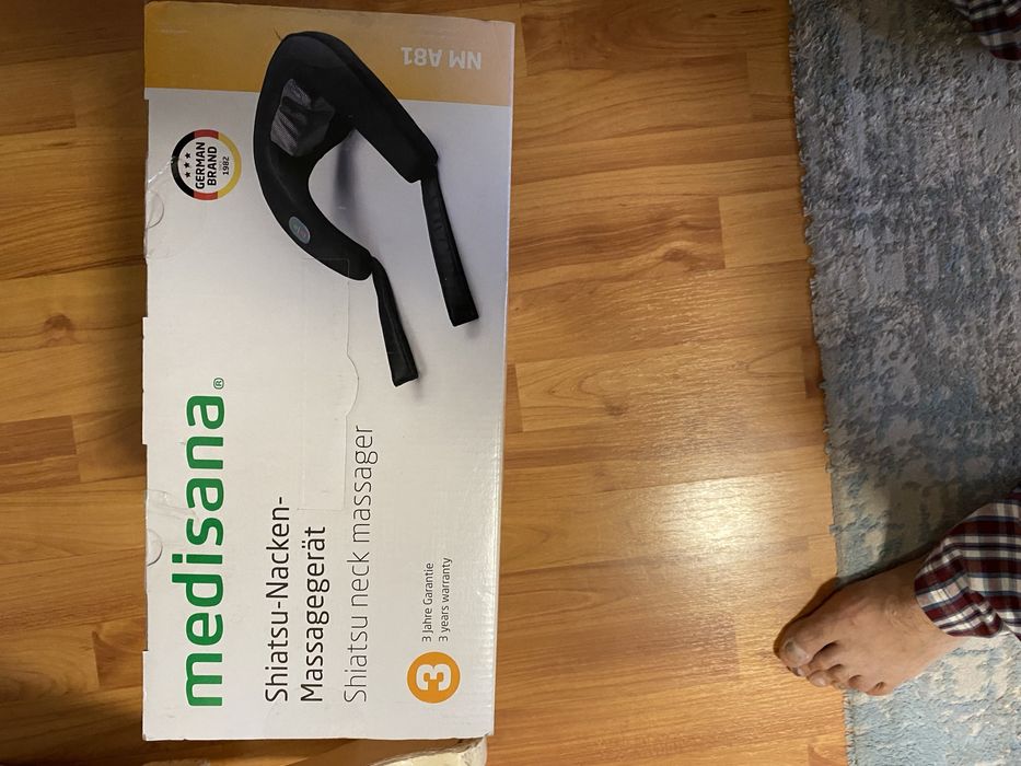 Aparat de masaj pentru gât