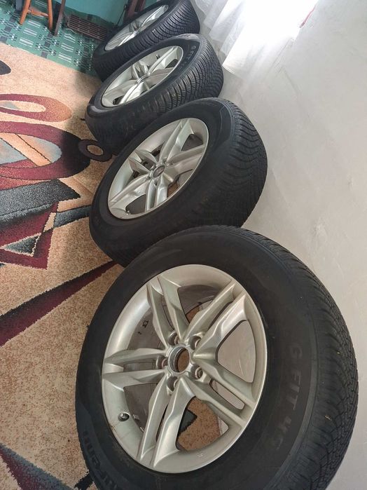 Cauciucuri de iarna aproape noi  genti aluminiu pt AUDI Q5  235/65/17