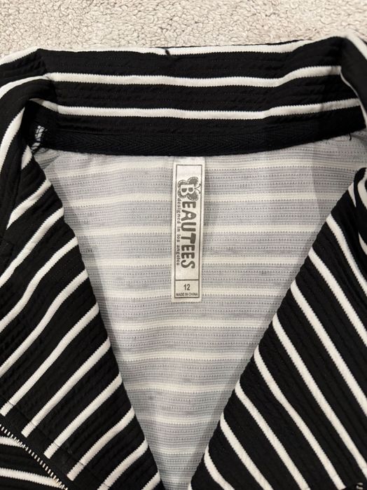 Връхна дреха за поводи