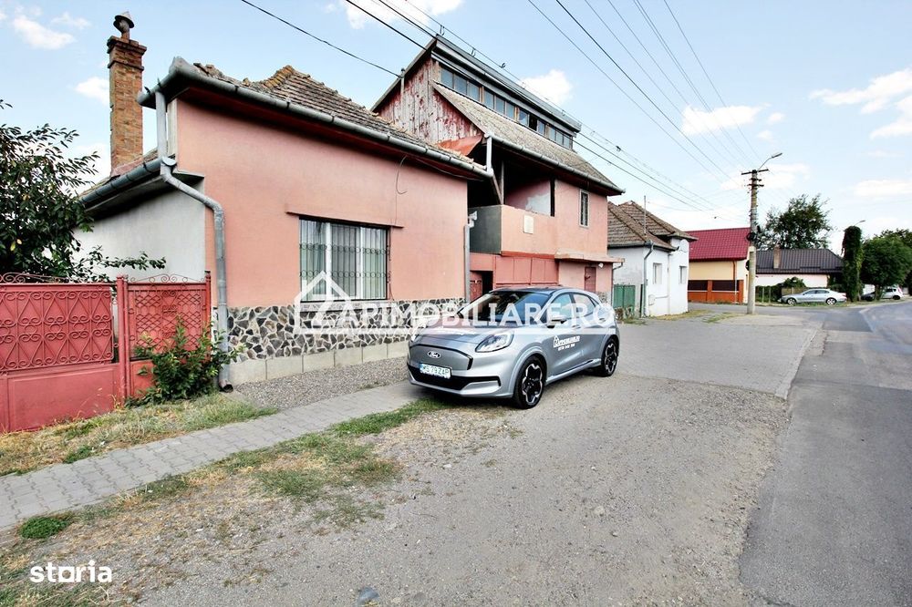 Casa+spatiu comercial,5 camere,2 bai.847mp teren,0%comision